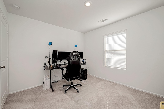 home office with light colored carpet