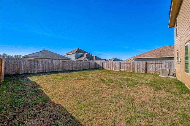 view of yard featuring central AC