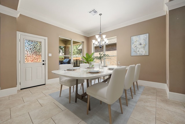 tiled dining space featuring an inviting chandelier and ornamental molding