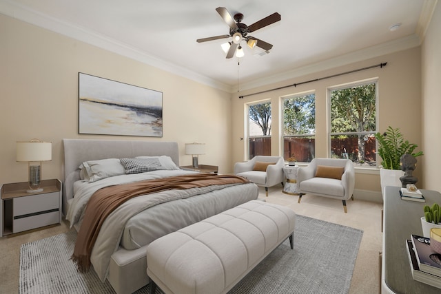 bedroom with ceiling fan, light colored carpet, and ornamental molding