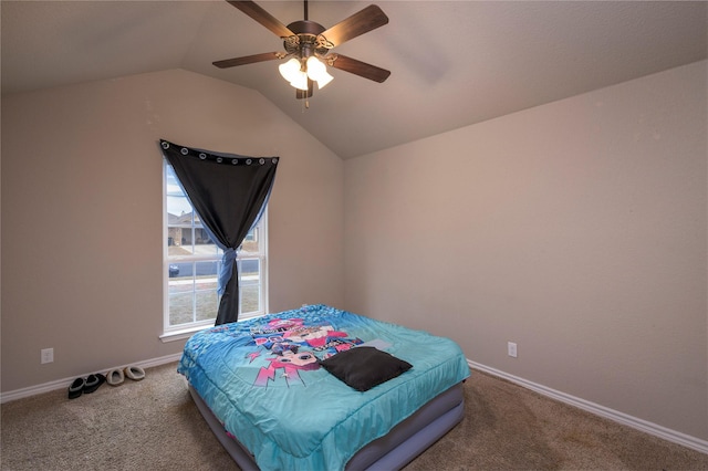 bedroom with carpet, vaulted ceiling, and ceiling fan