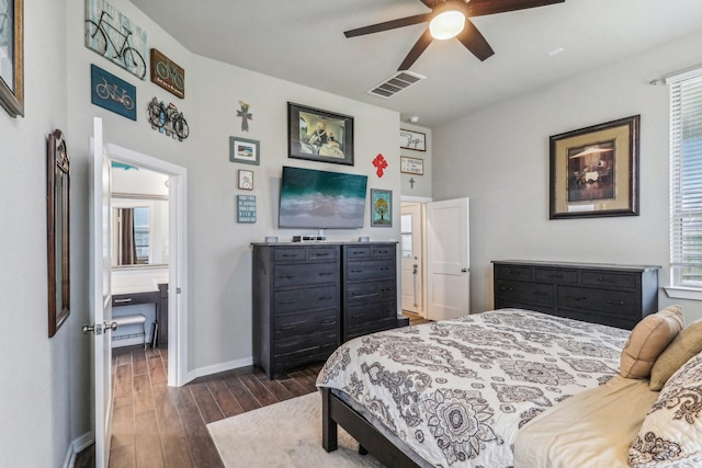 bedroom with ceiling fan and dark hardwood / wood-style floors