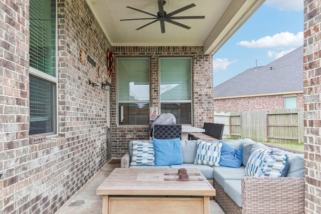 view of patio with outdoor lounge area and ceiling fan