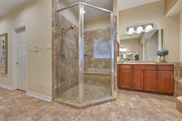 bathroom with vanity and walk in shower