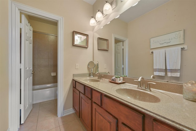 bathroom with tile patterned floors and vanity