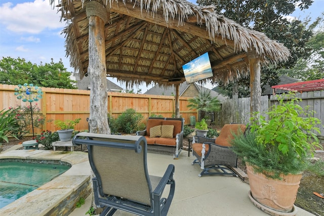 view of patio / terrace with outdoor lounge area and a fenced in pool