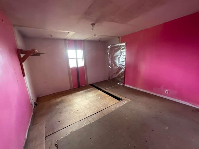 interior space featuring concrete flooring