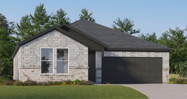 view of front facade featuring a garage and a front yard