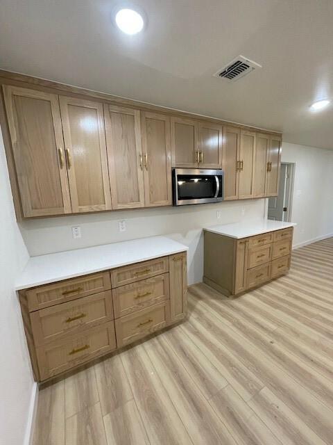 kitchen featuring light hardwood / wood-style floors