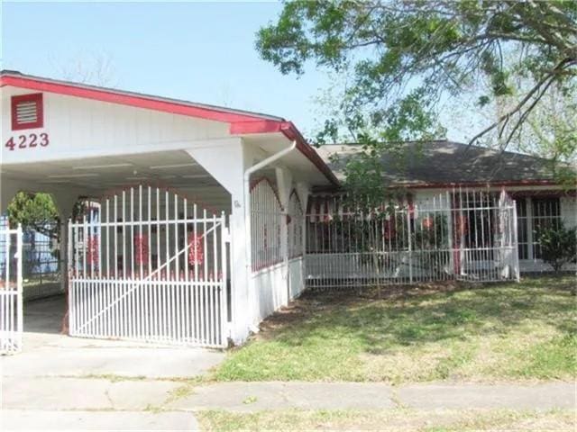 view of home's exterior with a carport