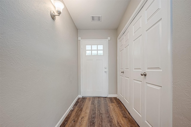 entryway featuring dark hardwood / wood-style floors