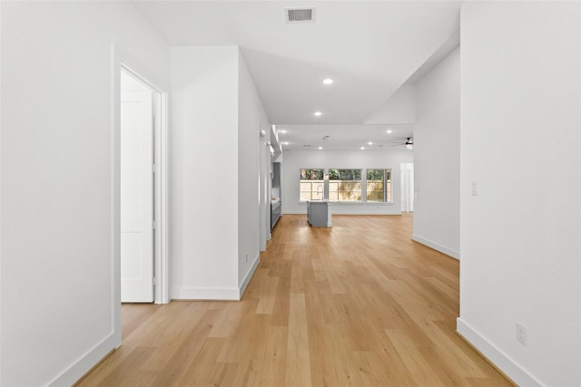 hallway featuring light hardwood / wood-style floors