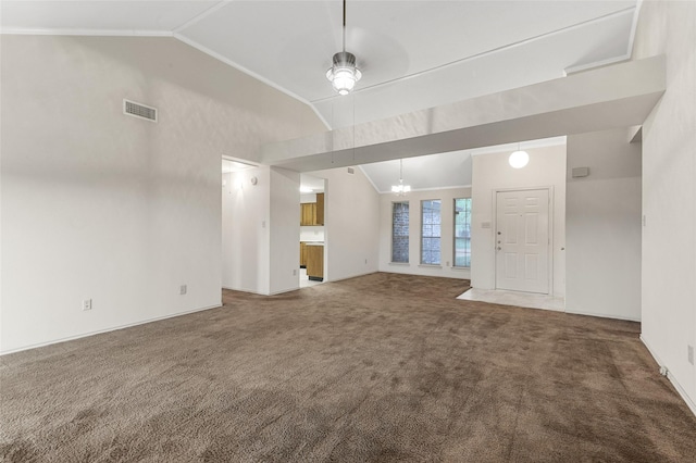 unfurnished living room featuring carpet flooring, high vaulted ceiling, and ceiling fan with notable chandelier