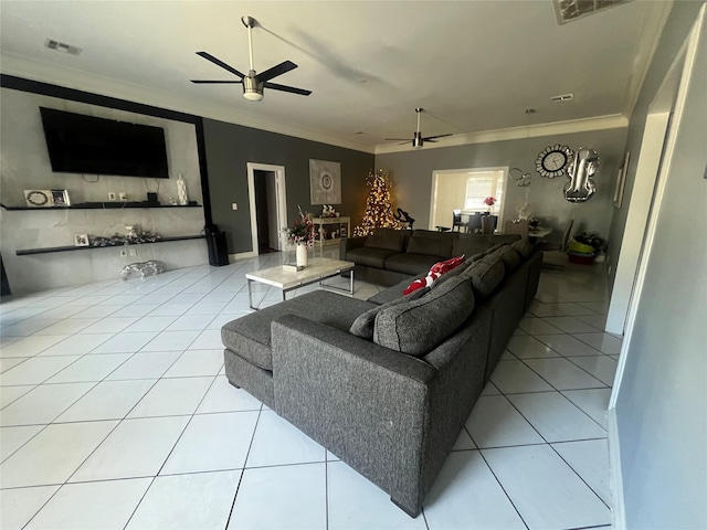 living room featuring light tile patterned flooring and ornamental molding