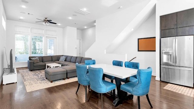 dining room featuring ceiling fan and dark hardwood / wood-style flooring