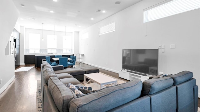 living room featuring dark hardwood / wood-style floors