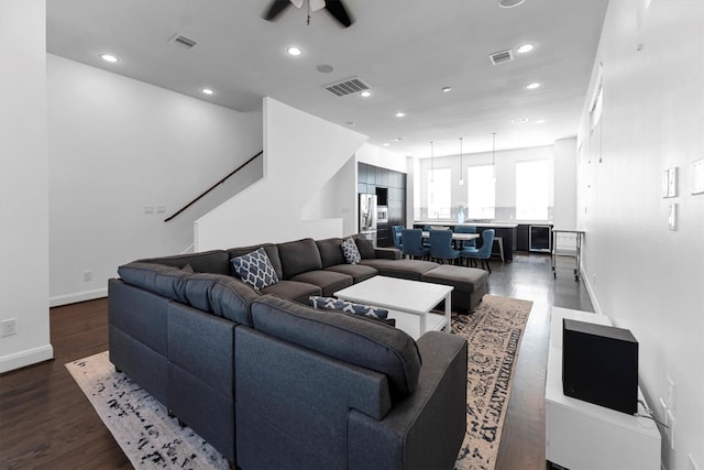 3111 Leeland St, Houston, TX 77003 - living room featuring ceiling fan, recessed lighting, dark wood-type flooring, stairway, and baseboards