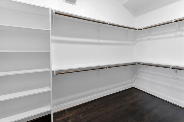 3111 Leeland St, Houston, TX 77003 - spacious closet featuring dark wood-style flooring