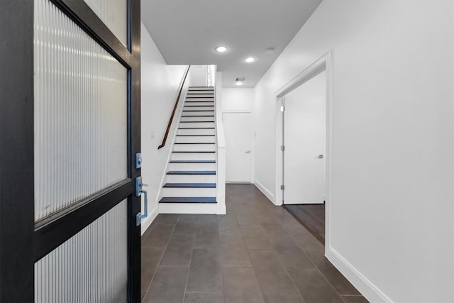 3111 Leeland St, Houston, TX 77003 - corridor featuring baseboards, stairway, and recessed lighting