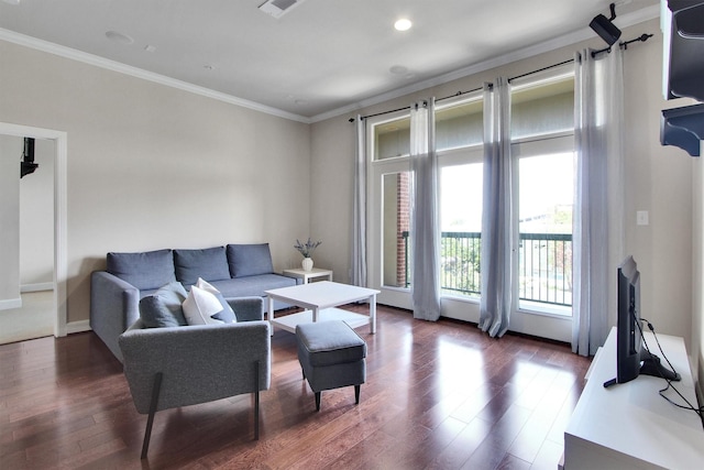 300 St Joseph Pkwy Unit 318, Houston, TX 77002 - living area featuring dark wood-style floors, crown molding, baseboards, and recessed lighting