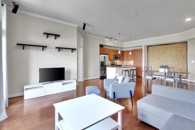 300 St Joseph Pkwy Unit 318, Houston, TX 77002 - living area featuring dark wood finished floors, ornamental molding, baseboards, and recessed lighting