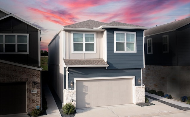 view of front of property featuring a garage