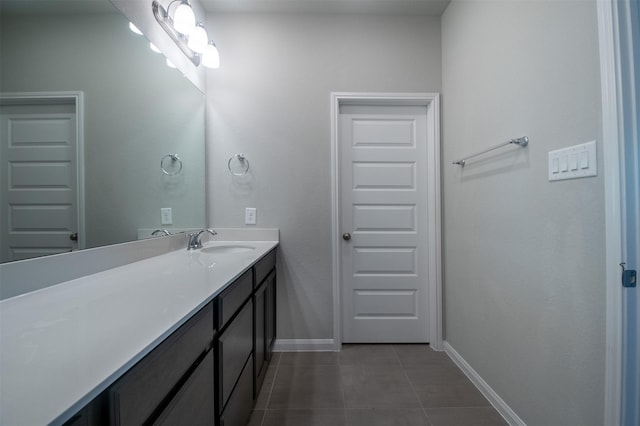 bathroom featuring tile patterned floors and vanity