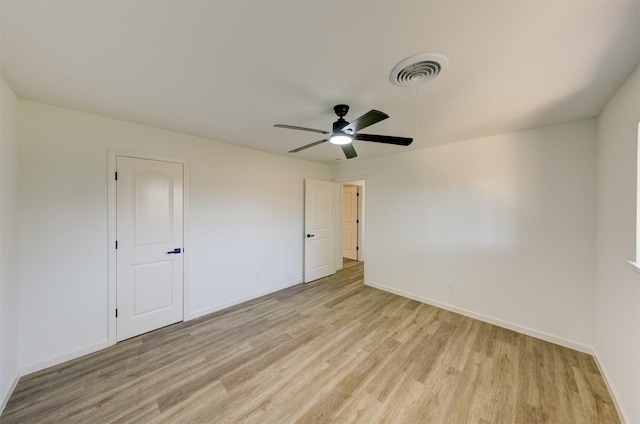 unfurnished room with ceiling fan and light hardwood / wood-style flooring