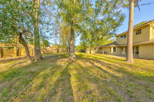 view of yard featuring central AC unit