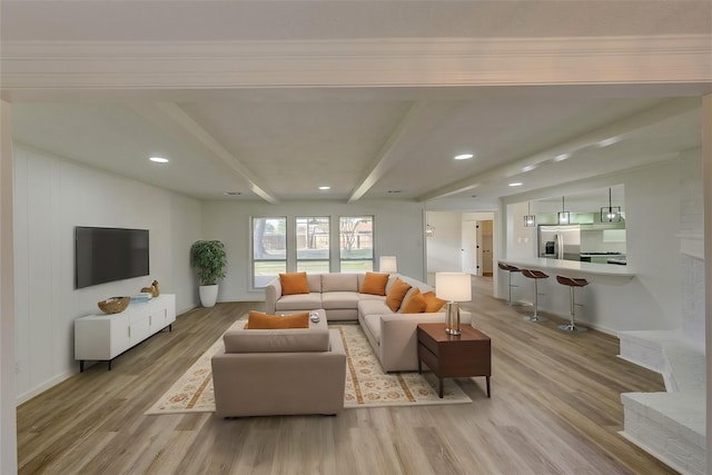 living room featuring light wood-type flooring and beam ceiling