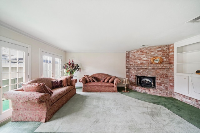 carpeted living room with french doors and crown molding