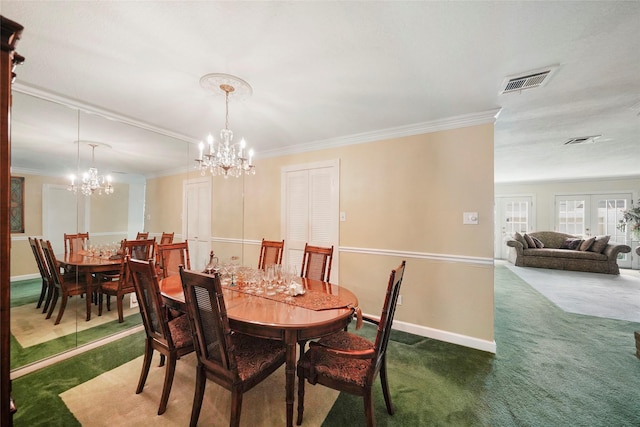 carpeted dining room with french doors, crown molding, and a notable chandelier