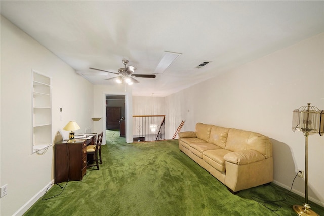 carpeted living room with ceiling fan