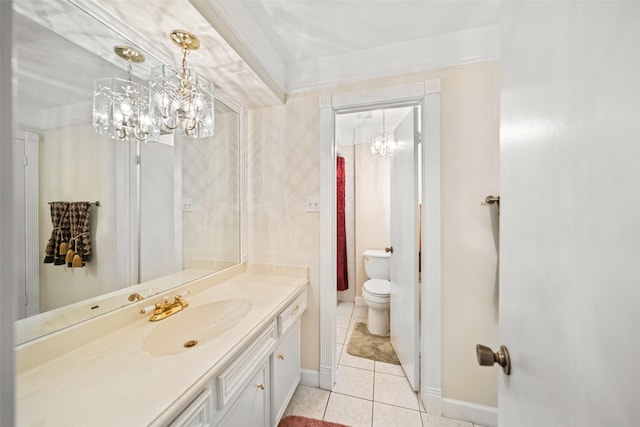 bathroom featuring tile patterned flooring, vanity, toilet, and an inviting chandelier