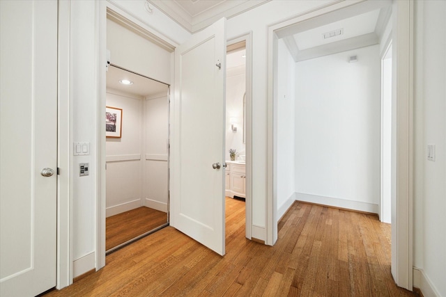 hallway featuring light wood-type flooring