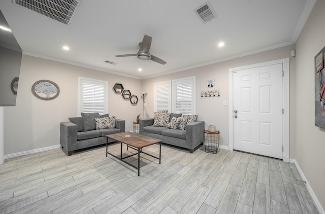 living room with ceiling fan, light hardwood / wood-style floors, and crown molding