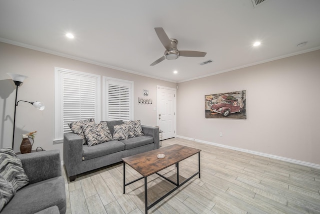 living room featuring light hardwood / wood-style flooring, ceiling fan, and crown molding