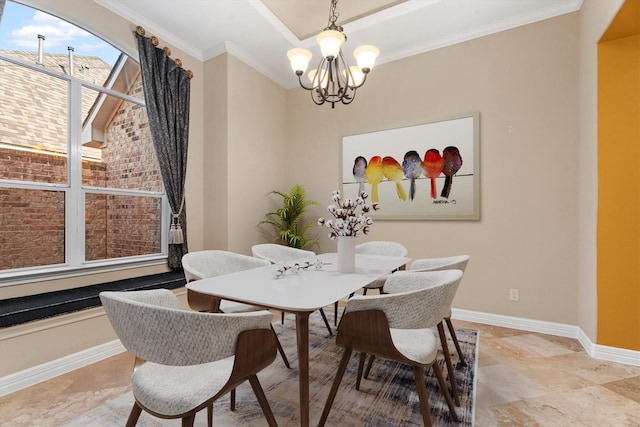 dining space with a chandelier and ornamental molding