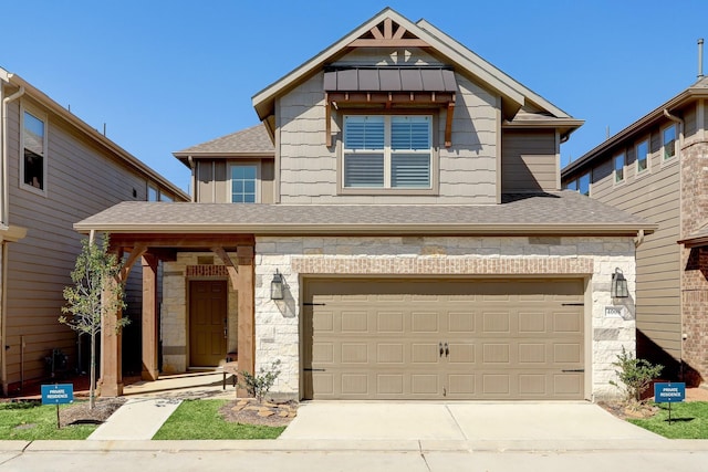 view of front of property with a garage