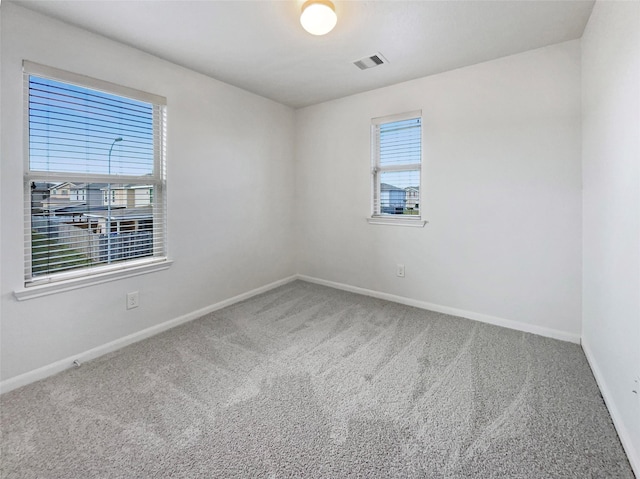 view of carpeted spare room