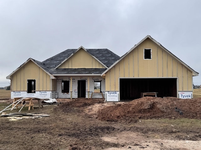 property under construction featuring a garage