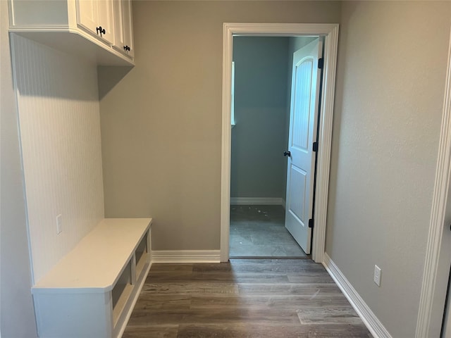 643 Longhorn Trl, Angleton, TX 77515 - mudroom featuring dark wood-type flooring and baseboards