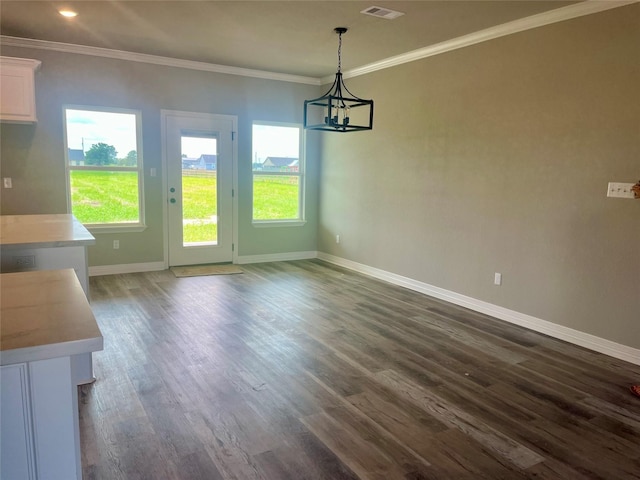 643 Longhorn Trl, Angleton, TX 77515 - unfurnished dining area with a chandelier, dark wood finished floors, and crown molding
