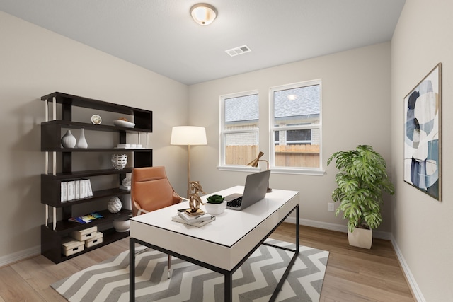 office area featuring light hardwood / wood-style floors