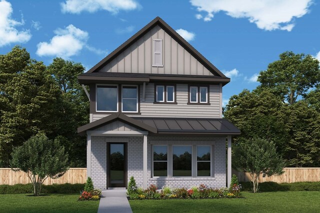 view of front facade with brick siding, a standing seam roof, a front lawn, and board and batten siding