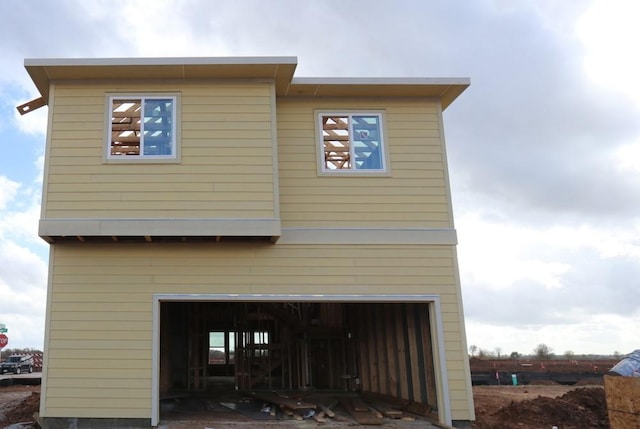 view of home's exterior with a garage