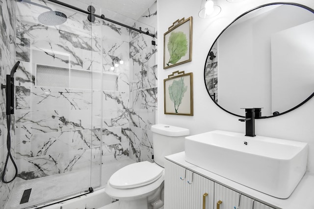 bathroom featuring vanity, toilet, and an enclosed shower