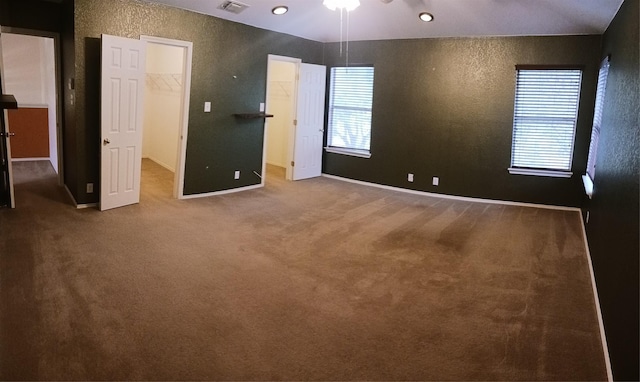 empty room featuring carpet floors