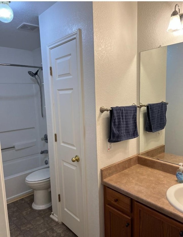 full bathroom with tile patterned flooring, vanity, toilet, and shower / bathtub combination