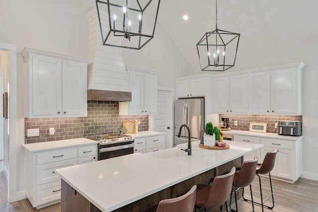 kitchen featuring white cabinets and stainless steel appliances